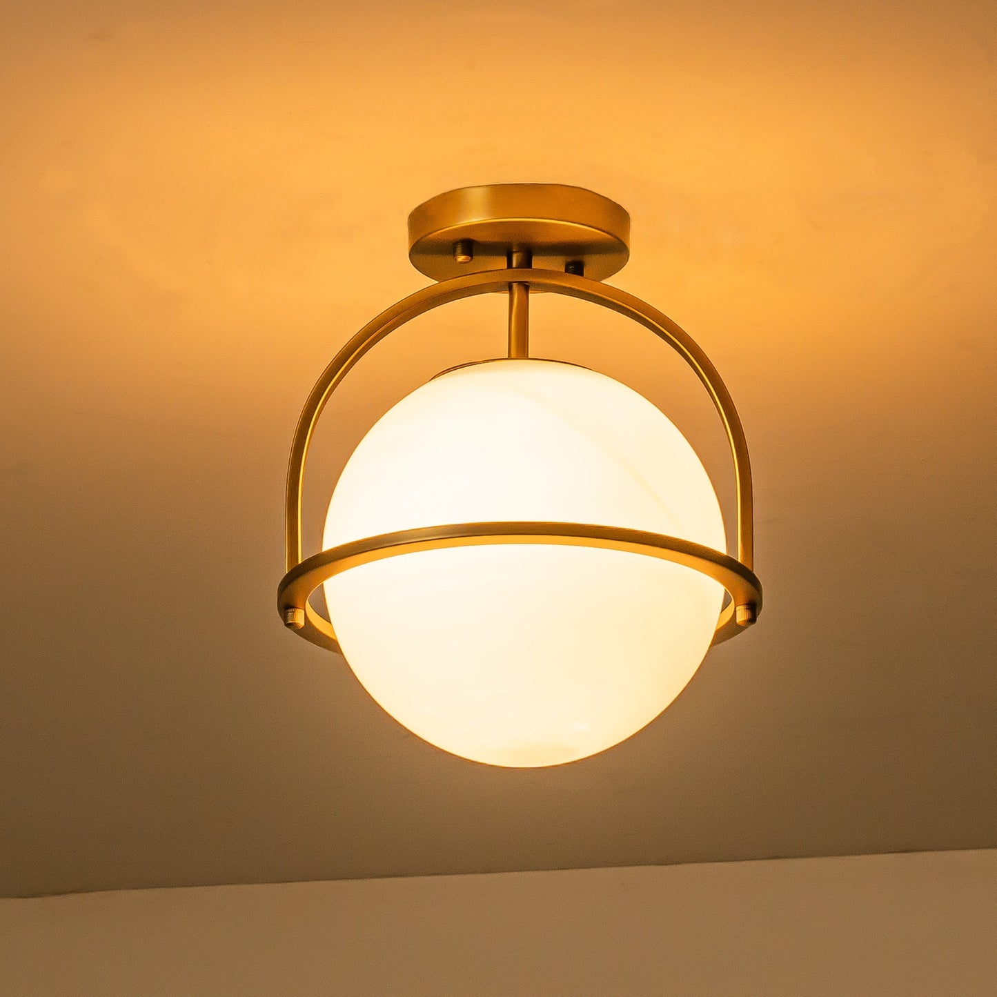 C Cattleya 1-Light Antique Brass Sphere Semi Flush Mount with Opal Glass Shade - Antique Brass