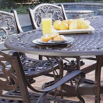 Sanibel Cast Aluminum 7-Piece Outdoor Dining Set with an Oval Table and 6 Swivel Chairs by Homestyles