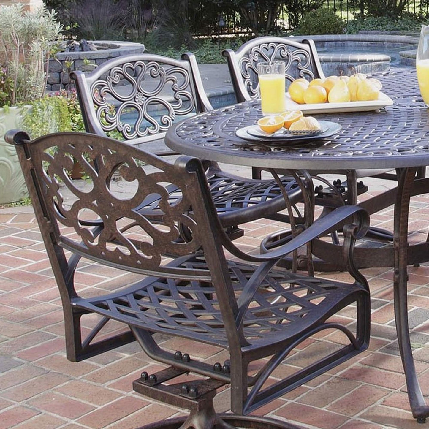Sanibel Cast Aluminum 7-Piece Outdoor Dining Set with an Oval Table and 6 Swivel Chairs by Homestyles